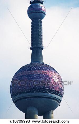 Stock Image -  the Round Area of the Oriental Pearl Tower Under a Blue Sky, Low Angle View, Shanghai, China. Fotosearch