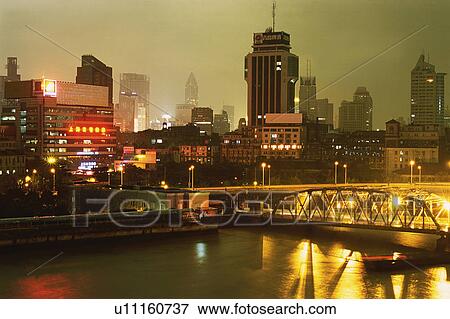 the Shanghai City By Night, the Buildings and Bridge Illuminated, Shanghai, China View Large Photo Image Stock Photo - the Shanghai City By Night, the Buildings and Bridge Illuminated, Shanghai, China. Fotosearch