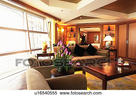 Stock Photography -  the Suite of the Grand Hyatt Shanghai, Decorated With Flowers and Expensive Furniture, Side View, Shanghai, China. Fotosearch