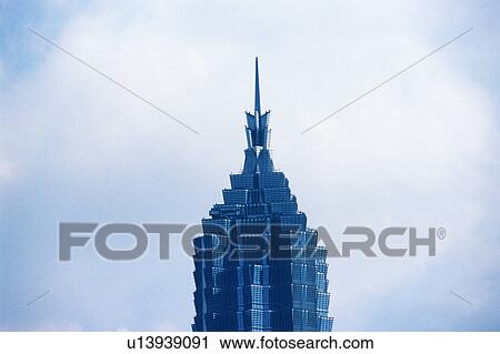 the Top of the Jin Mao Tower Under a Blue Sky, Low Angle View, Shanghai, China View Large Photo Image Stock Image - the Top of the Jin Mao Tower Under a Blue Sky, Low Angle View, Shanghai, China. Fotosearch