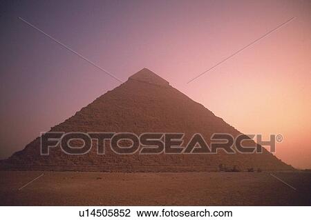 Stock Image - A pyramid in the sunrise, Egypt, Low Angle View. Fotosearch