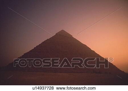 Stock Photo - A pyramid in the sunrise, Egypt, Low Angle View. Fotosearch