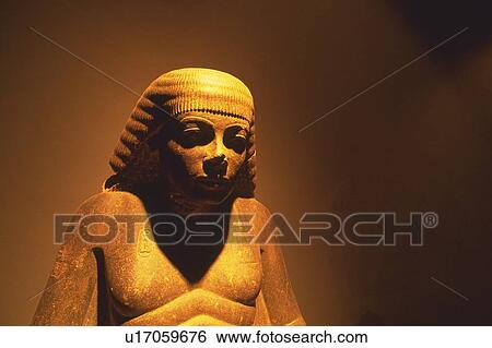Stock Photograph - A stone statue, Egypt, Low Angle View. Fotosearch