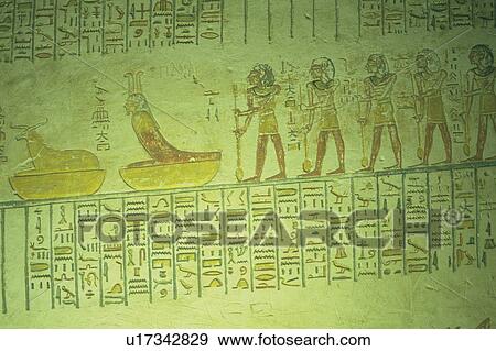 Hieroglyphs and paintings on the wall inside a tomb, Egypt, Low Angle View View Large Photo Image Stock Photo - Hieroglyphs and paintings on the wall inside a tomb, Egypt, Low Angle View. Fotosearch