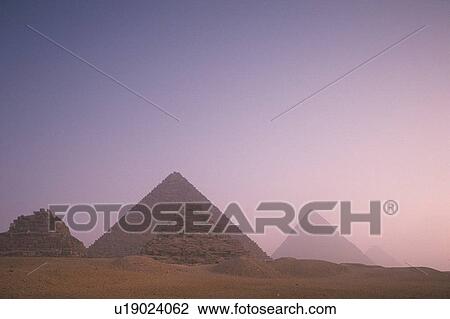 Pyramids in the sunrise, Egypt, Low Angle View View Large Photo Image Stock Image - Pyramids in the sunrise, Egypt, Low Angle View. Fotosearch