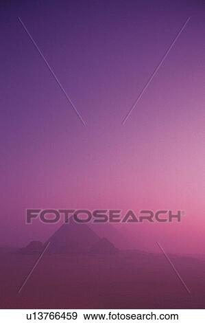 Stock Photo - Pyramids in the sunset, Egypt, Low Angle View. Fotosearch