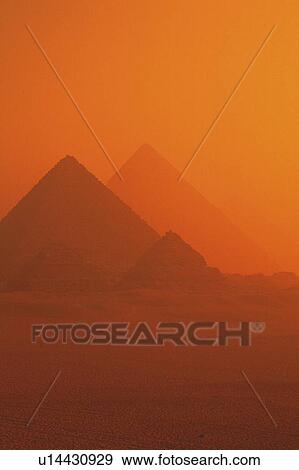 Stock Photo - Pyramids in the sunset, Egypt, Low Angle View. Fotosearch