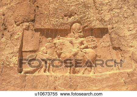 Stock Photography - Wall relief from the site of Persepolis, Iran, Low Angle View. Fotosearch