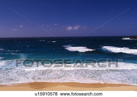 a Beach With Water That Has Different Blue Tones, High Angle View, Hawaii, USA View Large Photo Image Stock Photo - a Beach With Water That Has Different Blue Tones, High Angle View, Hawaii, USA. Fotosearch