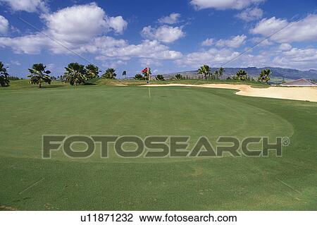 Stock Image -  a Huge Golf Course Under a Blue Sky, High Angle View, Hawaii, USA. Fotosearch