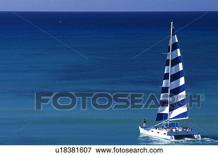 a Sailing Boat Floating on the Ocean Water, High Angle View, Copy Space, Hawaii, USA View Large Photo Image Stock Photo - a Sailing Boat Floating on the Ocean Water, High Angle View, Copy Space, Hawaii, USA. Fotosearch