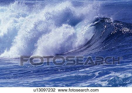 an Ocean Wave, the Water Splashing in Many Directions, Side View, Hawaii, USA View Large Photo Image Stock Image - an Ocean Wave, the Water Splashing in Many Directions, Side View, Hawaii, USA. Fotosearch