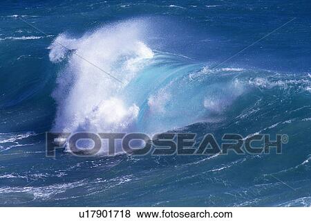 Stock Photo -  an Ocean Wave, the Water Splashing in Many Directions, High Angle View, Hawaii, USA. Fotosearch