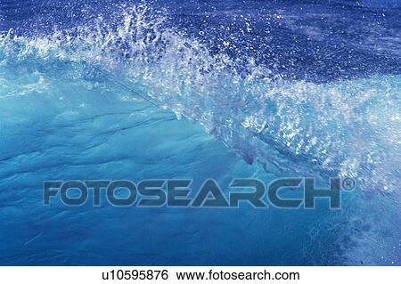 Stock Photograph - Splashing Water, the Water Light Blue-colored and Transparent, High Angle View, Hawaii, USA. Fotosearch