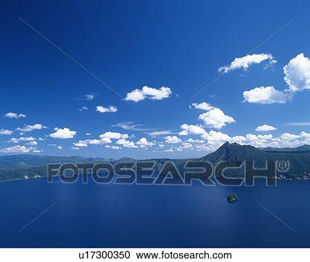 Stock Image -  the Lake Mashu Surrounded by a Mountain Chain, Hokkaido Prefecture, Japan. Fotosearch