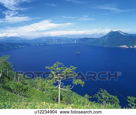the Lake Mashu, Surrounded By Trees, Green Bushes and a Mountainchain, High Angle View, Hokkaido Prefecture, Japan View Large Photo Image Picture - the Lake Mashu, Surrounded By Trees, Green Bushes and a Mountainchain, High Angle View, Hokkaido Prefecture, Japan. Fotosearch