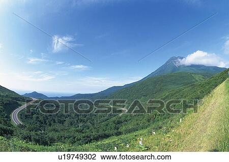 Stock Image -  the Mt. Rausudake Under a Blue Sky, Side View, Hokkaido Prefecture, Japan. Fotosearch