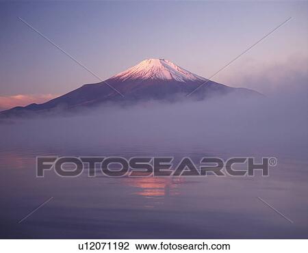 Mt. Fuji and Lake Yamanaka in the morning haze, Yamanakako town, Yamanashi prefecture, Japan View Large Photo Image Stock Image - Mt. Fuji and Lake Yamanaka in the morning haze, Yamanakako town, Yamanashi prefecture, Japan. Fotosearch