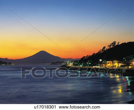 Mt. Fuji beyond the sea in the evening, Kamakura city, Kanagawa prefecture, Japan View Large Photo Image Stock Image - Mt. Fuji beyond the sea in the evening, Kamakura city, Kanagawa prefecture, Japan. Fotosearch
