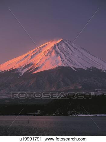 Stock Image - Mt. Fuji in the morning, Kawaguchiko town, Yamanashi prefecture, Japan. Fotosearch