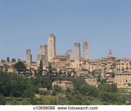 Stock Photograph - Historic Centre of San Gimignano, Italy, Europe, Low Angle View, Pan Focus. Fotosearch