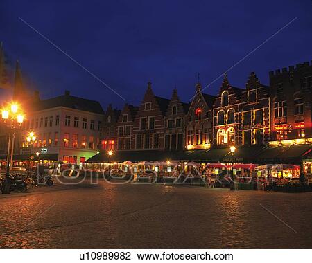Stock Image - Market Square, Brugge, Belgium, Europe, Front View, Long Exposure, Lens Flare. Fotosearch
