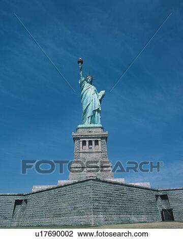 Stock Image - The Statue of Liberty, New York, U. S. A., Low Angle View, Pan Focus. Fotosearch