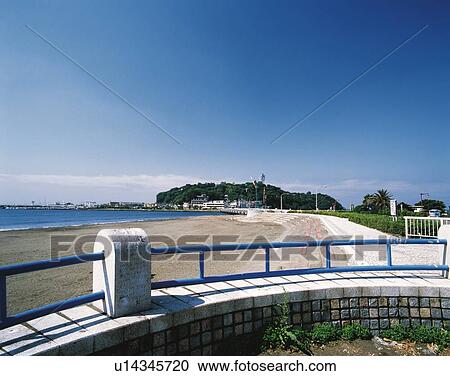 Stock Image - Katasehigashi Beach and Enoshima Bridge, Shonan, Kanagawa Prefecture, Japan, Front View, Pan Focus. Fotosearch