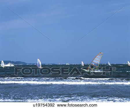Sailboards on Ocean, Katasehigashi Beach, Shonan, Kanagawa Prefecture, Japan, Front View, Pan Focus View Large Photo Image Stock Image - Sailboards on Ocean, Katasehigashi Beach, Shonan, Kanagawa Prefecture, Japan, Front View, Pan Focus. Fotosearch