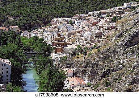 Stock Photo - Spain, Castilla la mancha, Cuenca, House, Houses, Tree, Trees. Fotosearch