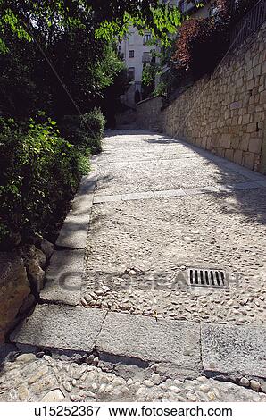 Stock Photo - Spain, Castilla la mancha, Cuenca, Way, Paved, Paving, Narrow. Fotosearch