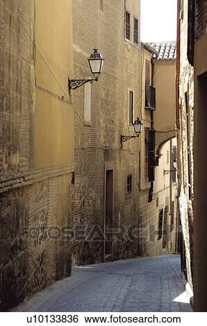 Stock Photograph - Spain, Castilla la mancha, Toledo, City, Small street, Alley, Street. Fotosearch