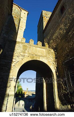 Stock Photograph - Spain, Extremadura, Caceres, Trujillo, Architecture, Arch, Exterior. Fotosearch