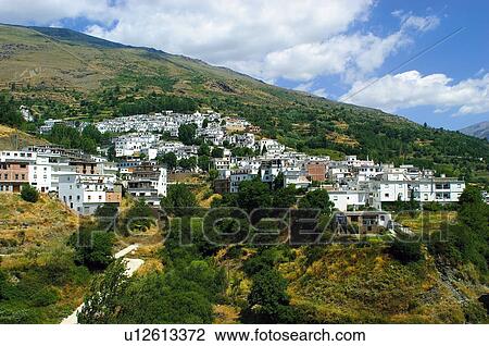 Stock Image - Spain, Andalucia, Andalusia, Granada, Trevelez, Village, Valley. Fotosearch