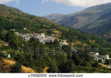 Stock Image - Spain, Andalucia, Andalusia, Granada, Trevelez, Village, Valley. Fotosearch