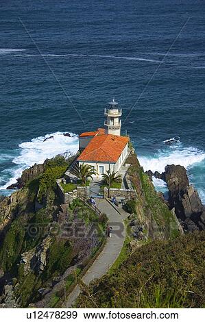 Stock Photo - Spain, Asturias, Cudillero, Sea, Roof, Roofs, Lighthouse. Fotosearch