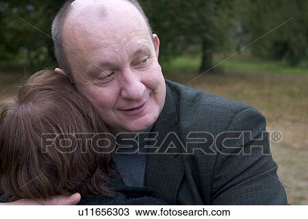 Friends hugging greeting, Zawady, Central Poland View Large Photo Image Stock Image - Friends hugging greeting, Zawady, Central Poland. Fotosearch