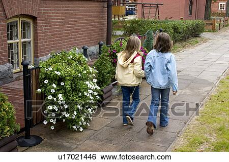 Stock Photograph - Polish children walking down the street. Fotosearch