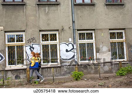 Stock Photo - School kids walking home, Lodz, Central Poland. Fotosearch