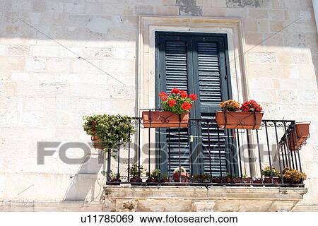 Stock Photo - Window balcony in Sicily Italy . Fotosearch