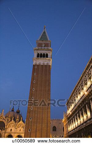 Campanile in Piazza San Marco at dusk in Venice, Italy. View Large Photo Image Stock Photo - Campanile in Piazza San Marco at dusk in Venice, Italy.. Fotosearch