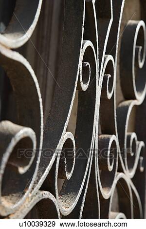 Stock Photo - Close-up of wrought iron scrolls in Venice, Italy.. Fotosearch