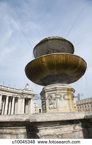 Stock Photo - Fountain in Saint Peter's Square in Vatican City, Italy.. Fotosearch