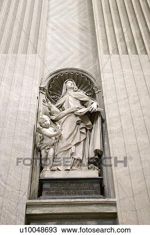 Saint Teresa statue inside St. Peter's Basilica in Rome, Italy. View Large Photo Image Stock Image - Saint Teresa statue inside St. Peter's Basilica in Rome, Italy.. Fotosearch