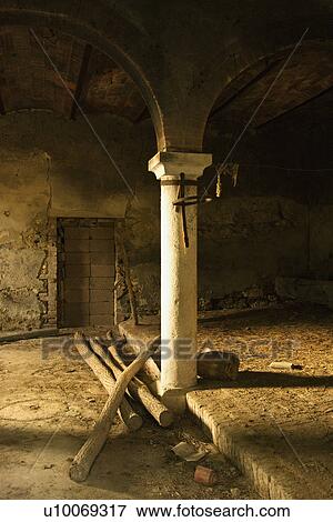 Sunlight filling old abandoned building with column and arches in Tuscany, Italy. View Large Photo Image Stock Photo - Sunlight filling old abandoned building with column and arches in Tuscany, Italy. . Fotosearch