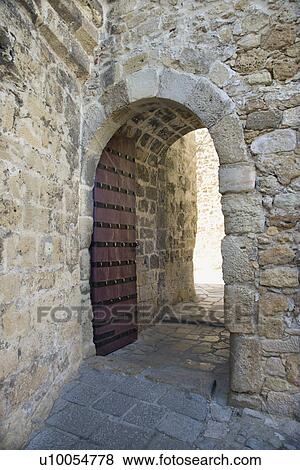 Stock Photo - Arched doorway in Lisbon, Portugal.. Fotosearch