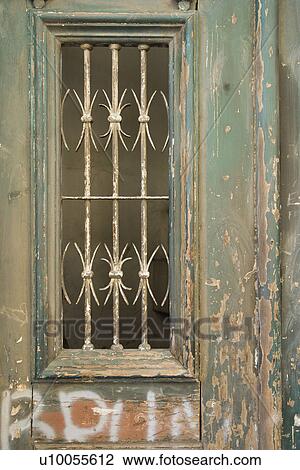 Close-up of ornate door with peeling paint and graffiti in Lisbon, Portugal. View Large Photo Image Stock Image - Close-up of ornate door with peeling paint and graffiti in Lisbon, Portugal.. Fotosearch