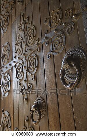 Close-up of wooden doors with decorative metalwork in Lisbon, Portugal. View Large Photo Image Stock Image - Close-up of wooden doors with decorative metalwork in Lisbon, Portugal.. Fotosearch