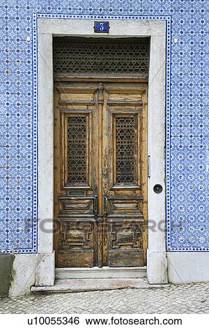 Exterior doors and tiled building in Lisbon, Portugal. View Large Photo Image Stock Photograph - Exterior doors and tiled building in Lisbon, Portugal.. Fotosearch