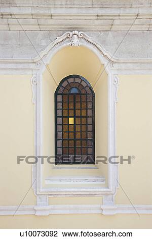 Recessed window with colored panes in building in Lisbon, Portugal. View Large Photo Image Stock Image - Recessed window with colored panes in building in Lisbon, Portugal.. Fotosearch